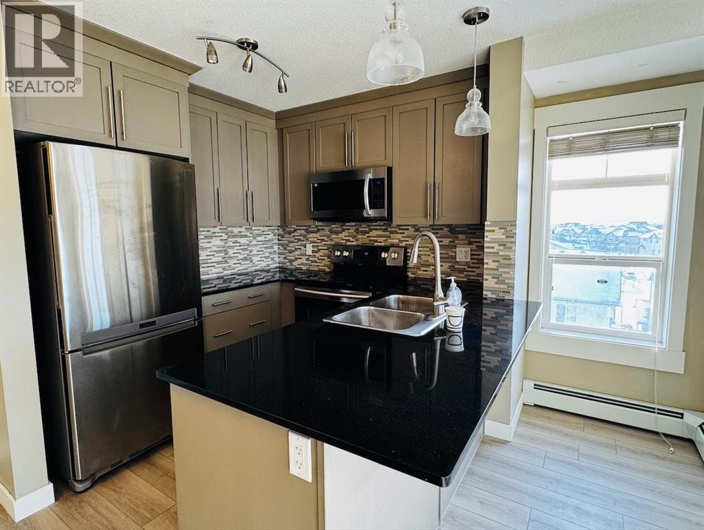 6413, 155 Skyview Ranch Way NE — photo 4