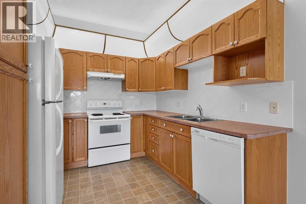 325, 728 Country Hills Road NW — photo 8