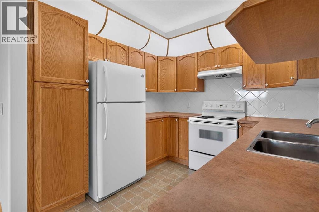 325, 728 Country Hills Road NW — photo 9