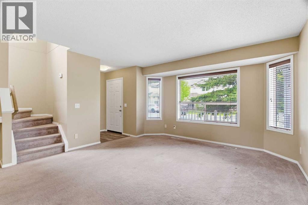 109 Arbour Wood Mews NW — photo 3