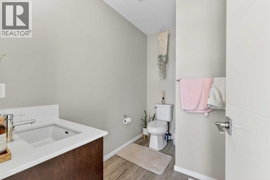 203, 445 Redstone Walk NE — photo 24