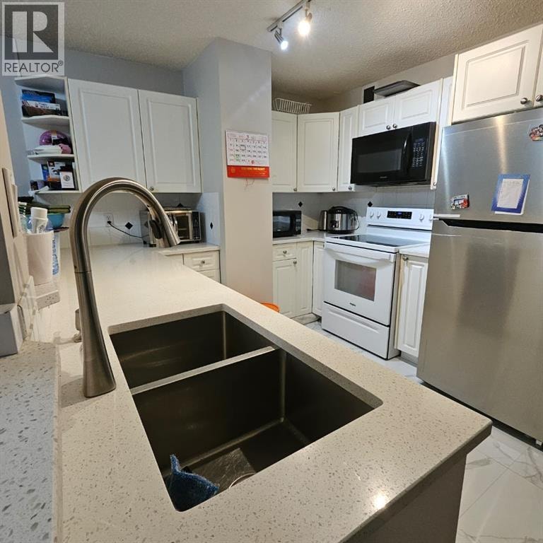 203, 511 56 Avenue SW — photo 4