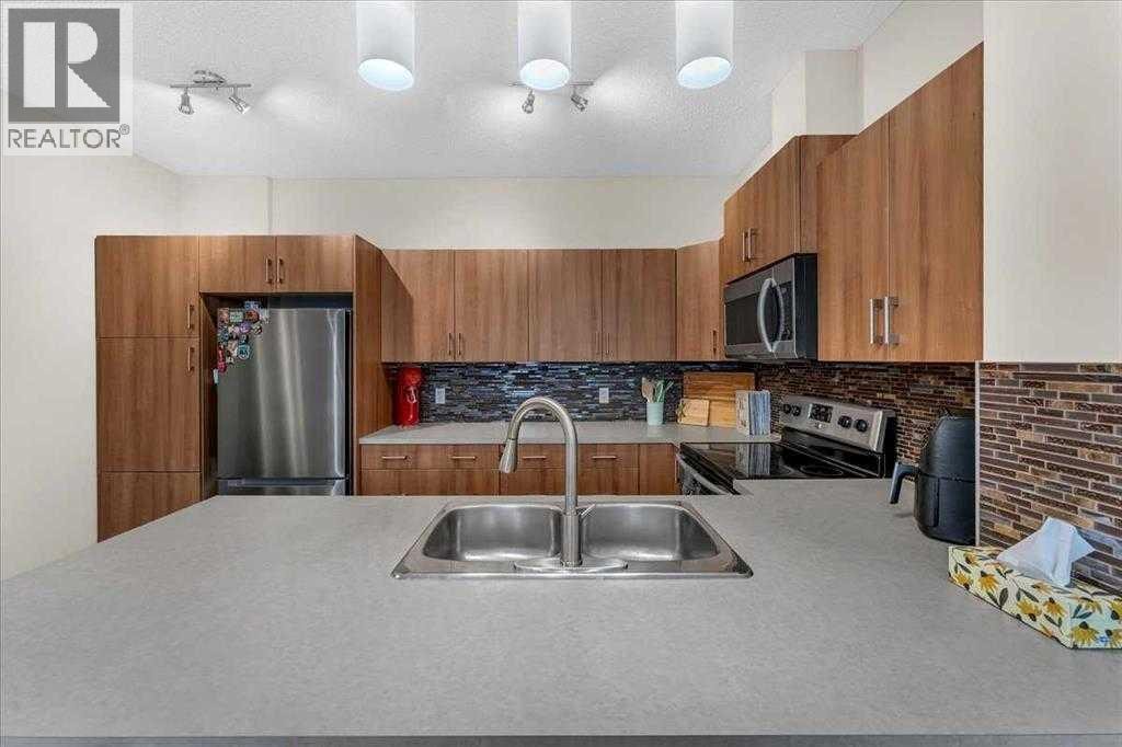 315, 10 Auburn Bay Avenue SE — photo 13