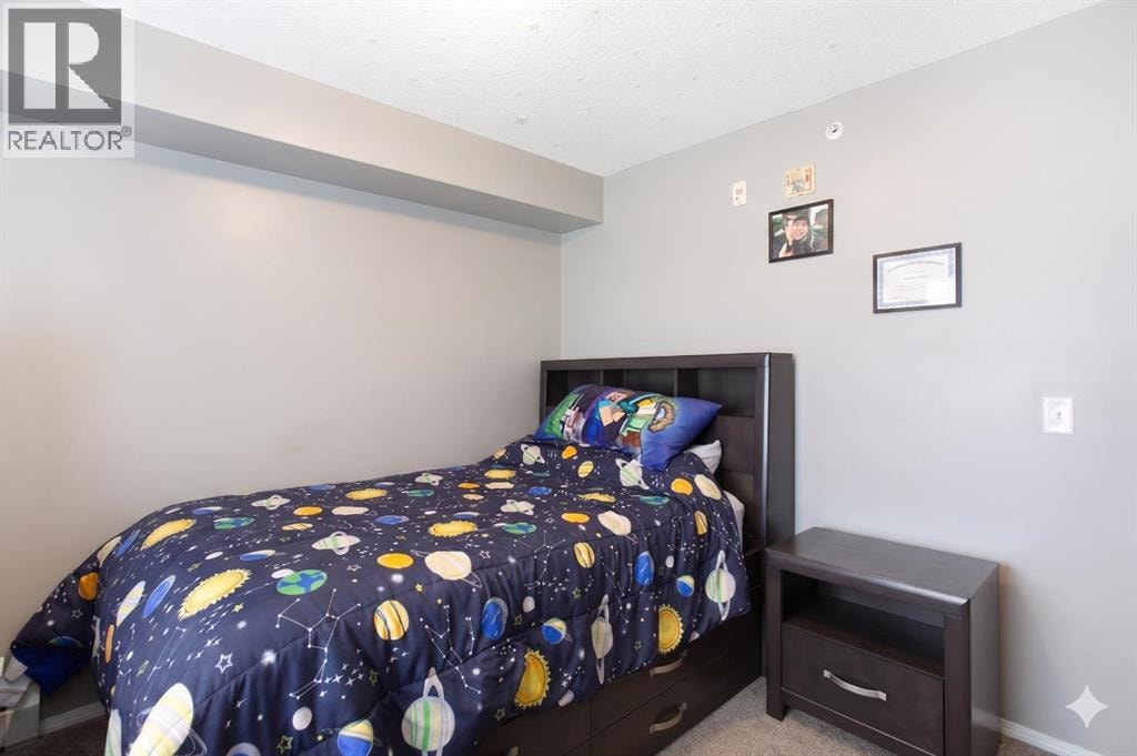 6405, 304 Mackenzie Way SW — photo 18