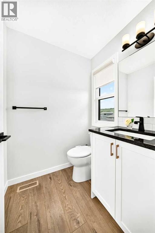 791 Cranbrook Gardens SE — photo 40