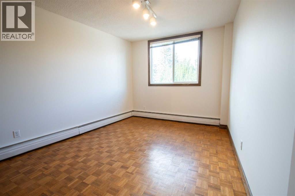201, 512 Cedar Crescent SW — photo 22
