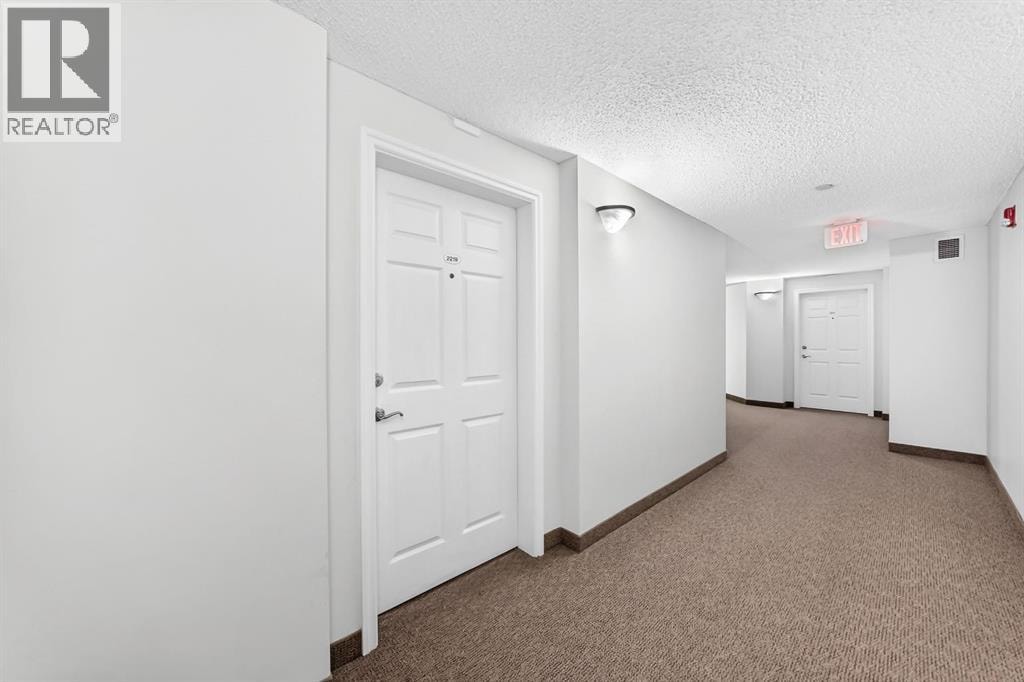 2219, 950 Arbour Lake Road NW — photo 4