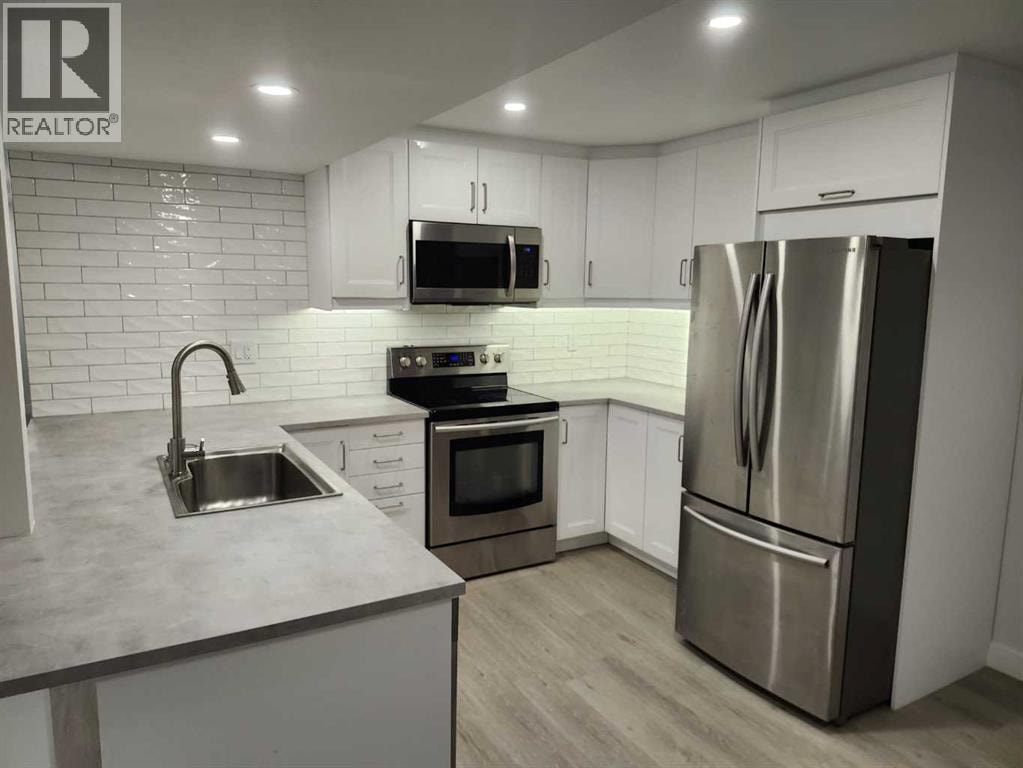 12108 Lake Waterton Way SE — photo 24