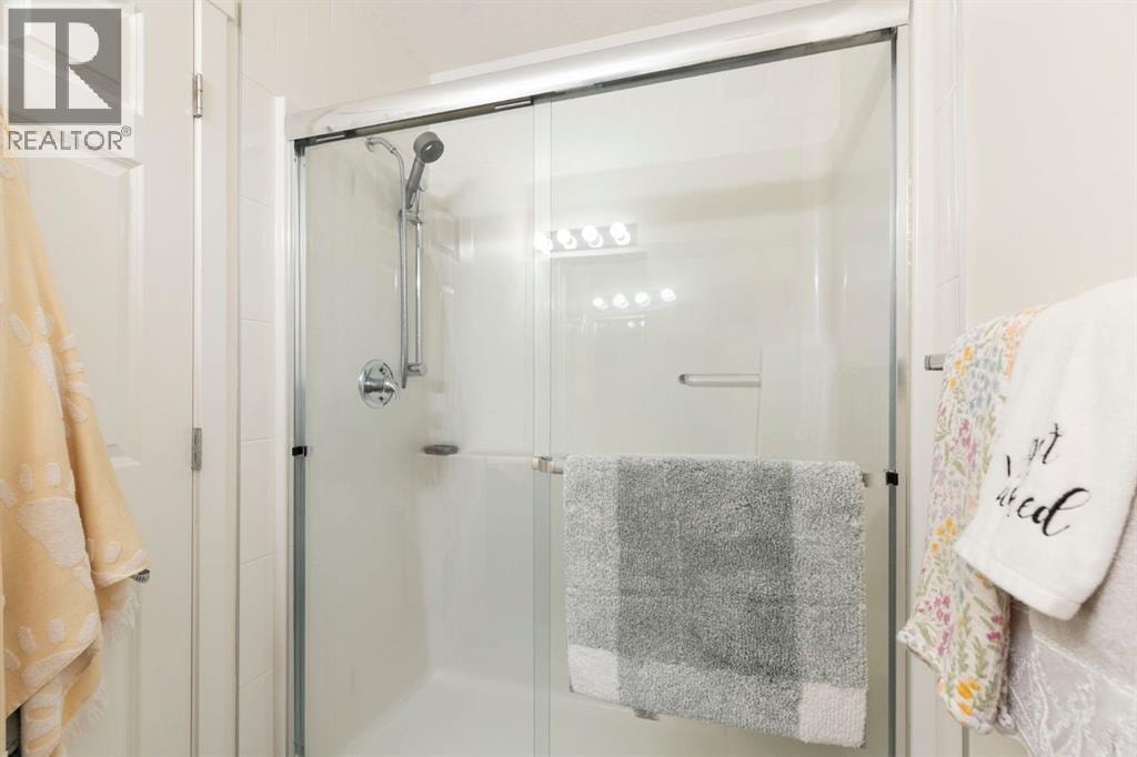 2102, 298 Sage Meadows Park NW — photo 14