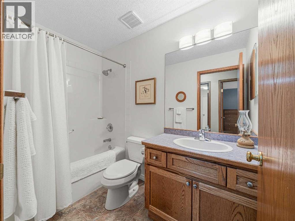 301 Arbour Cliff Close NW — photo 18