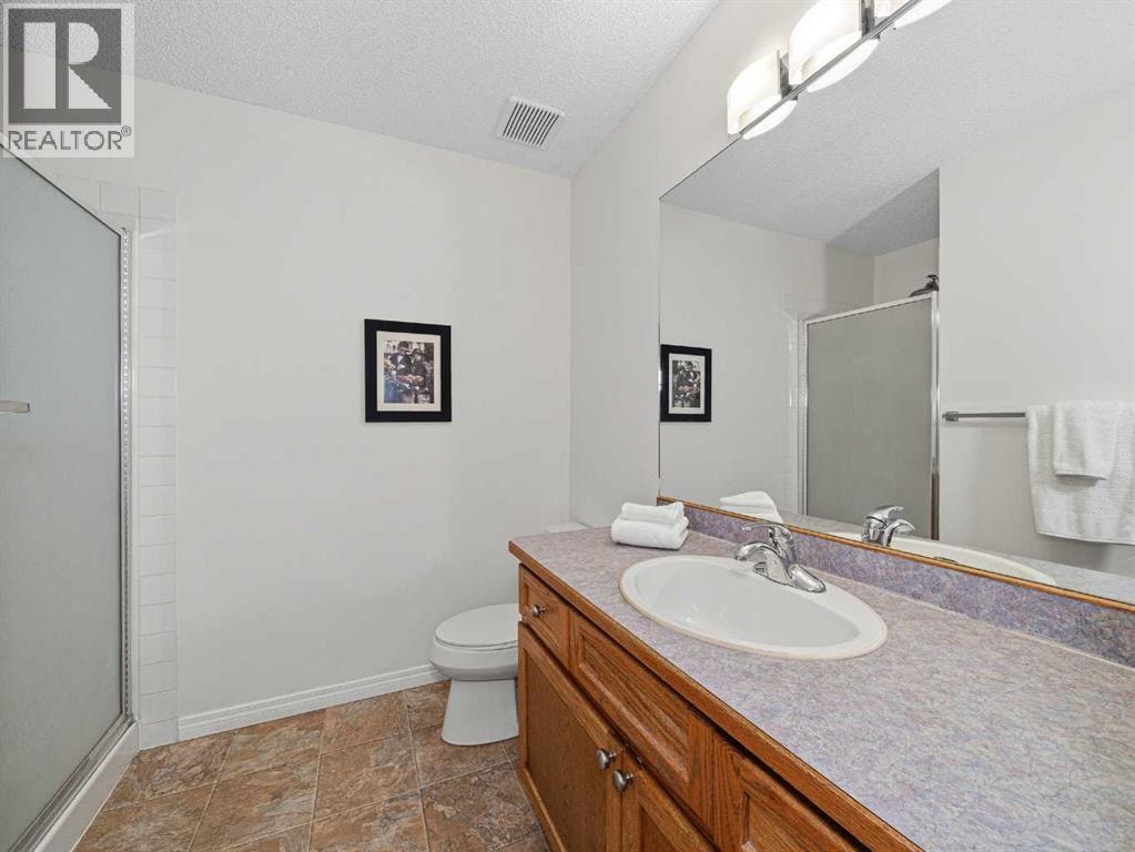 301 Arbour Cliff Close NW — photo 16