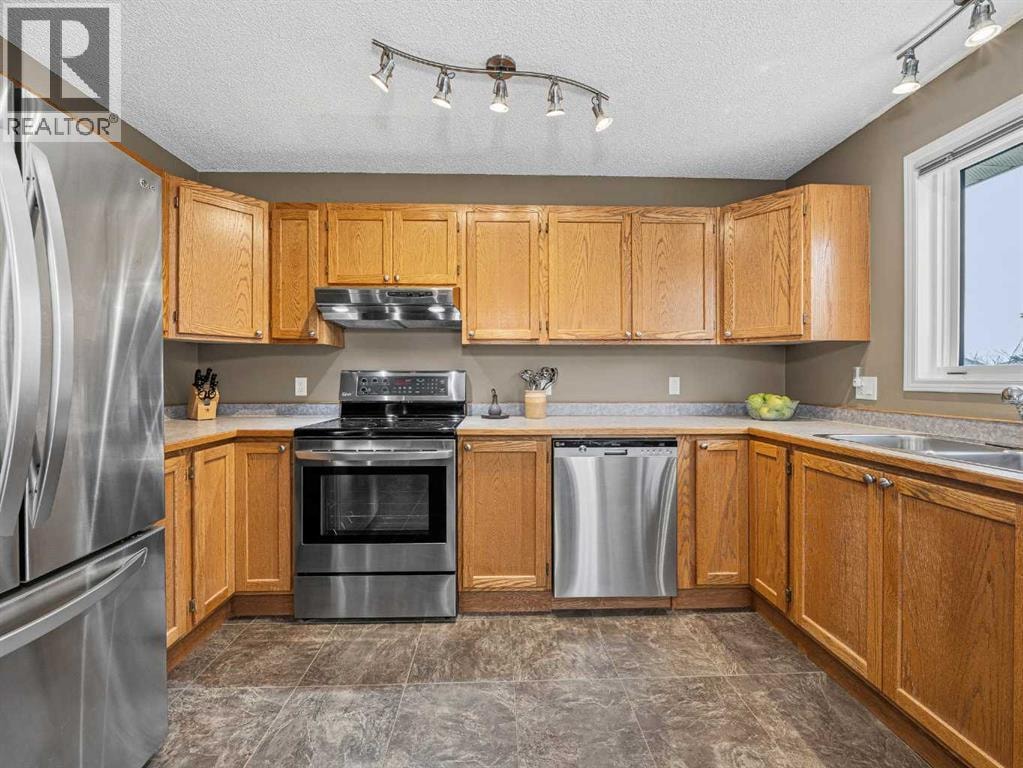 301 Arbour Cliff Close NW — photo 10