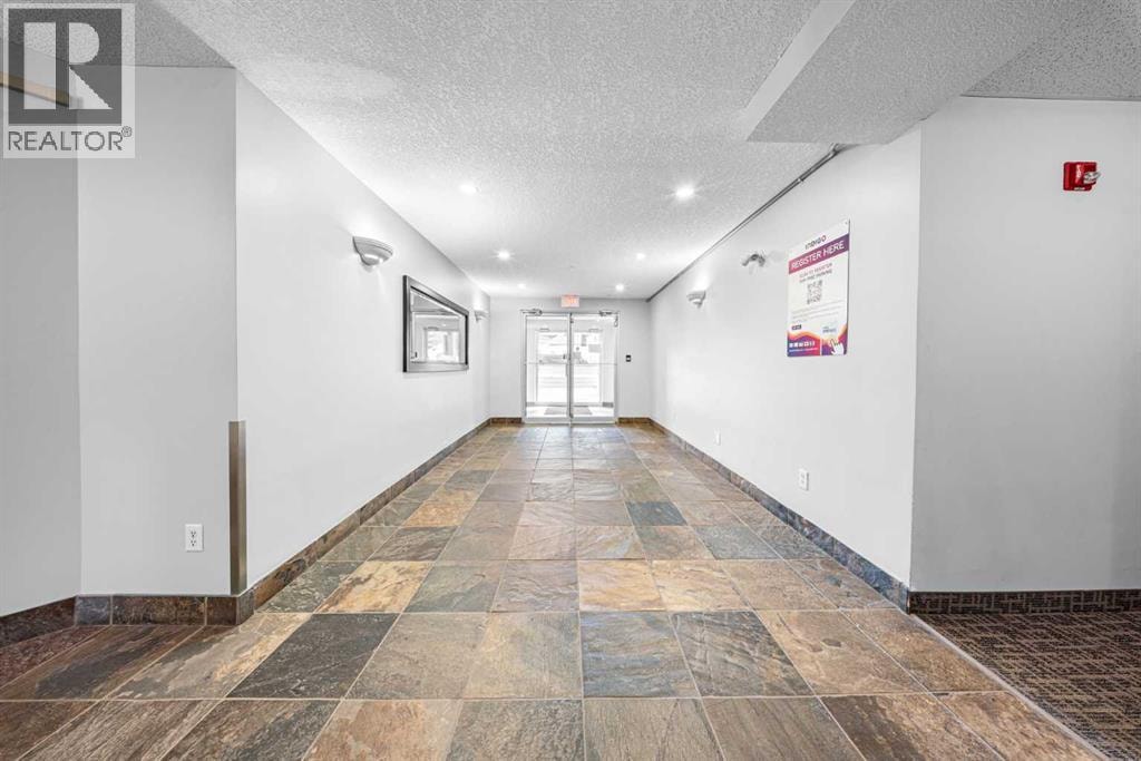 1104, 70 Panamount Drive NW — photo 3