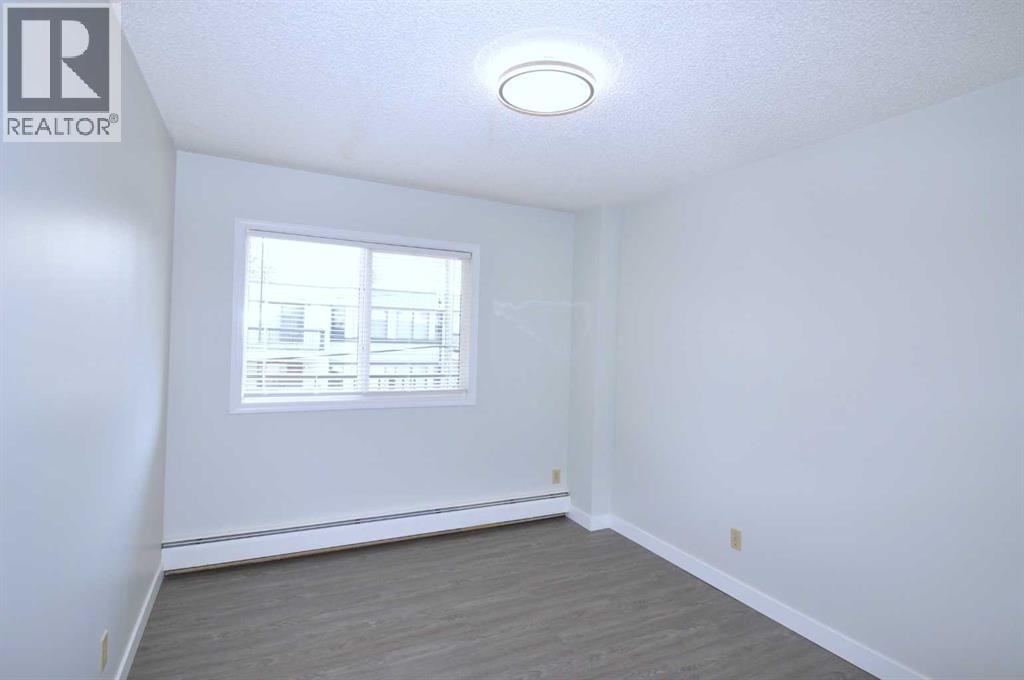 303, 635 56 Avenue SW — photo 11