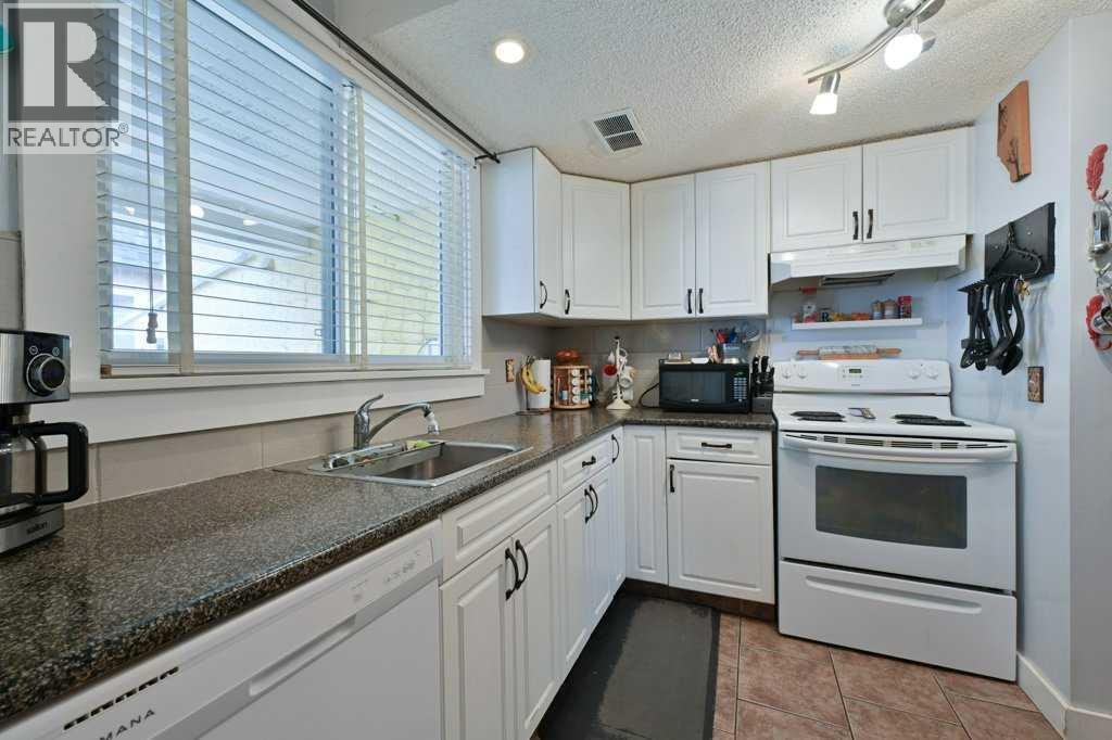 5, 7740 Hunterview Drive NW — photo 7
