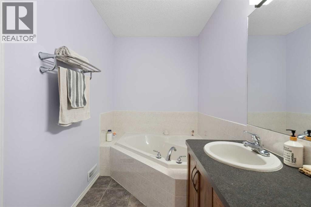 57 Saddlemont Grove NE — photo 35
