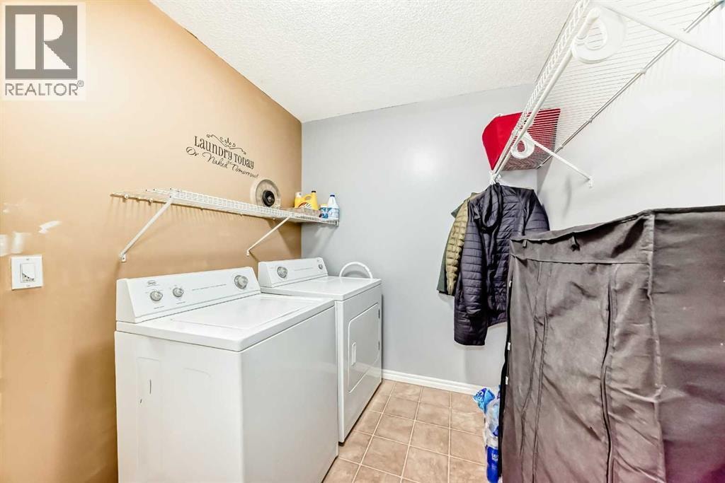 304, 2384 Sagewood Gate SW — photo 18