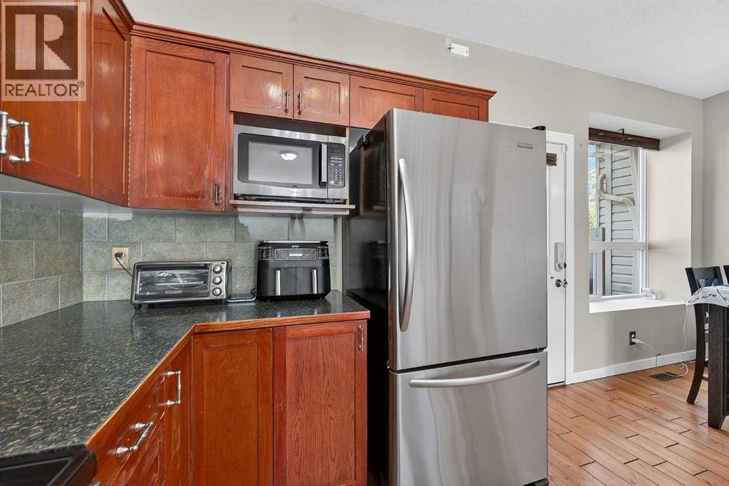 402, 2005 Luxstone Boulevard SW — photo 21