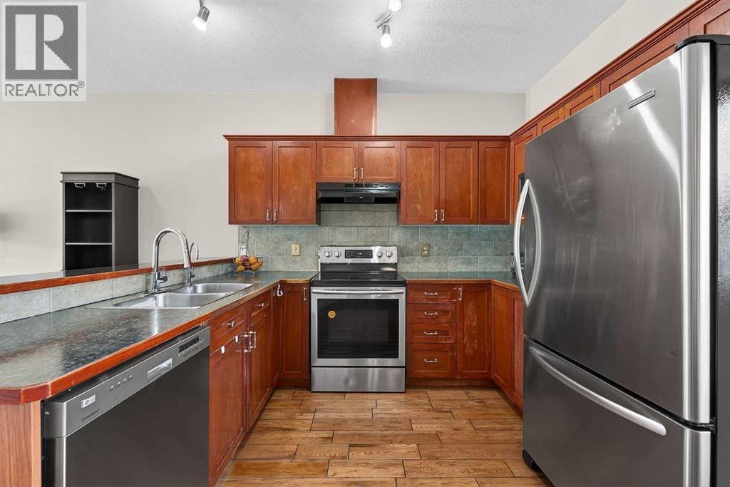 402, 2005 Luxstone Boulevard SW — photo 17