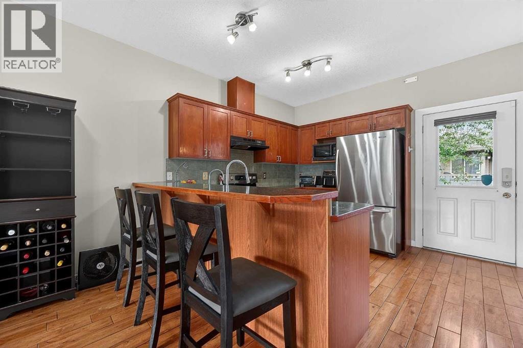 402, 2005 Luxstone Boulevard SW — photo 13