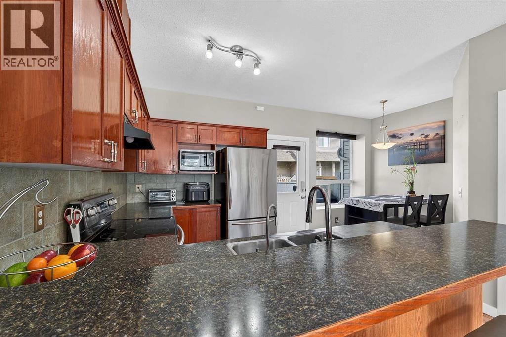 402, 2005 Luxstone Boulevard SW — photo 15
