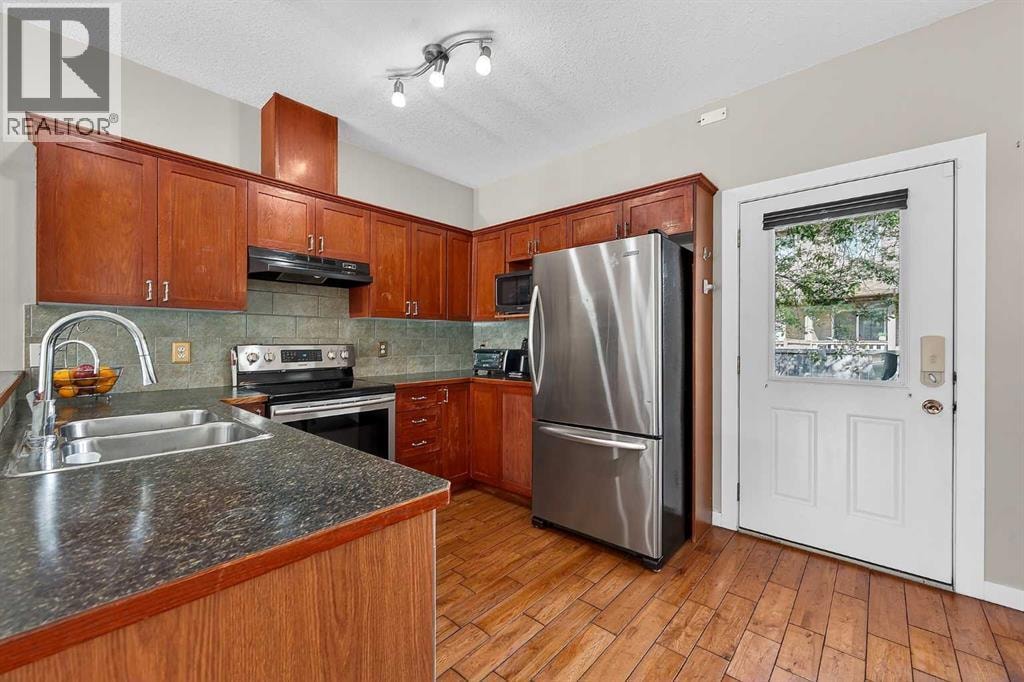 402, 2005 Luxstone Boulevard SW — photo 16