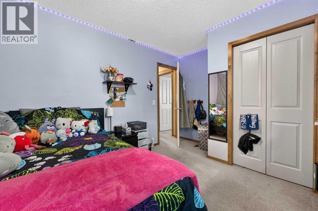 60 Tuscany Ridge Crescent NW — photo 37