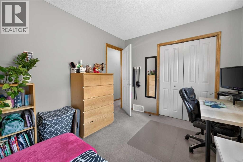 60 Tuscany Ridge Crescent NW — photo 35