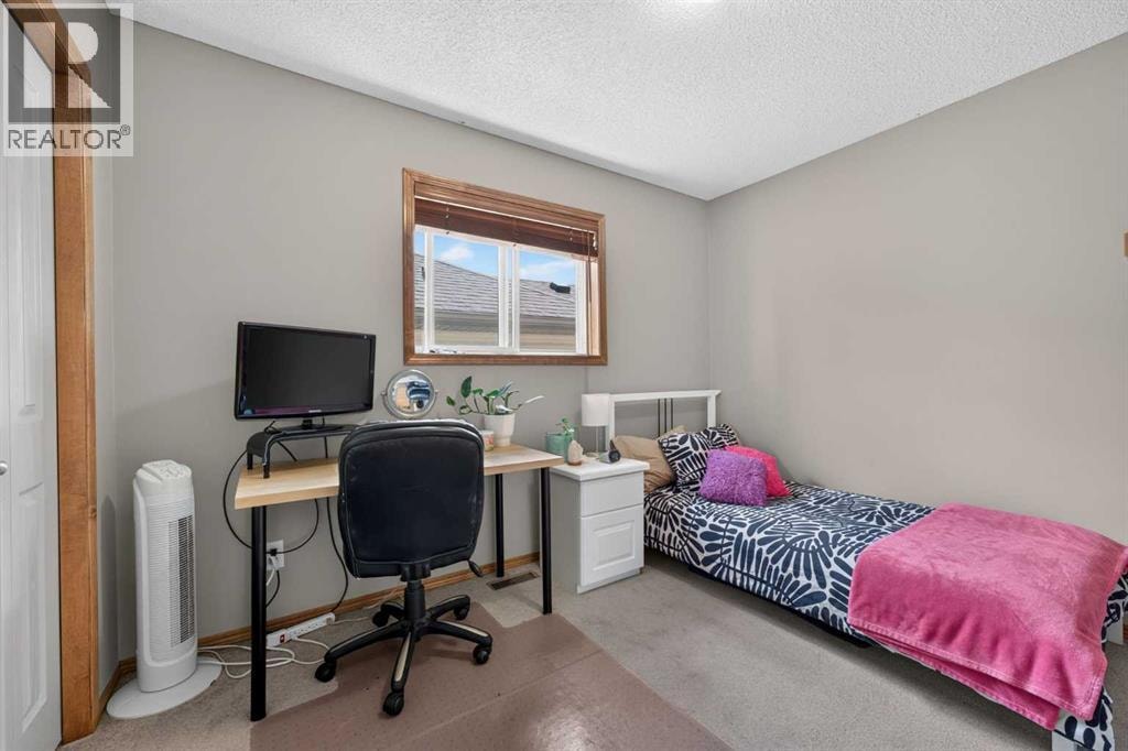 60 Tuscany Ridge Crescent NW — photo 34