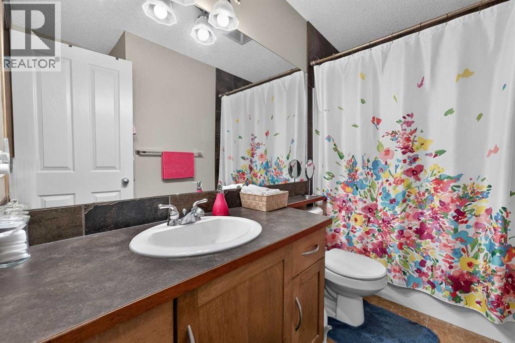 60 Tuscany Ridge Crescent NW — photo 38