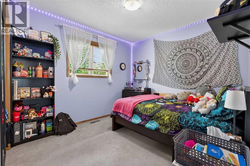 60 Tuscany Ridge Crescent NW — photo 36