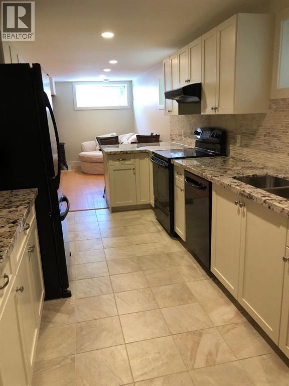 609 23 Avenue SW — photo 38