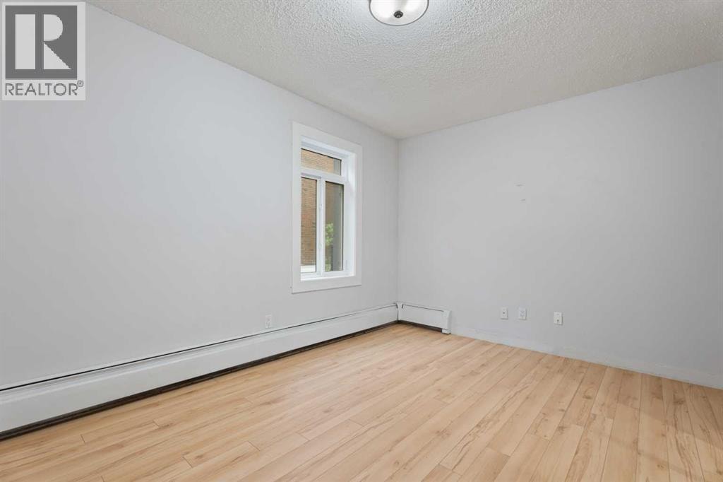208, 819 4A Street NE — photo 20