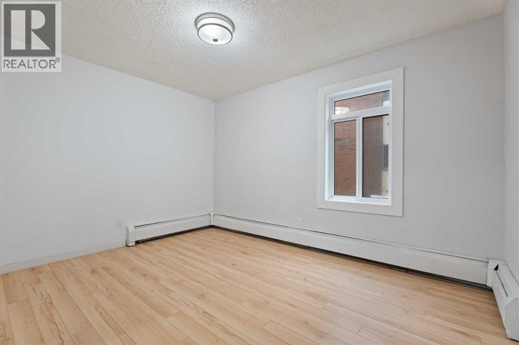 208, 819 4A Street NE — photo 17