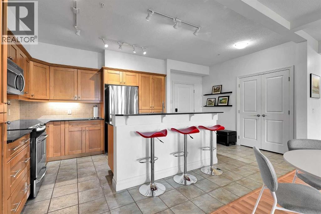 2105, 10221 Tuscany Boulevard NW — photo 5