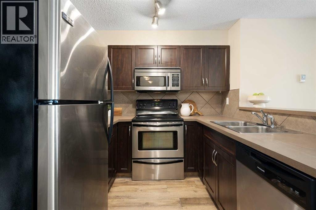 5209, 69 Country Village Manor NE — photo 12