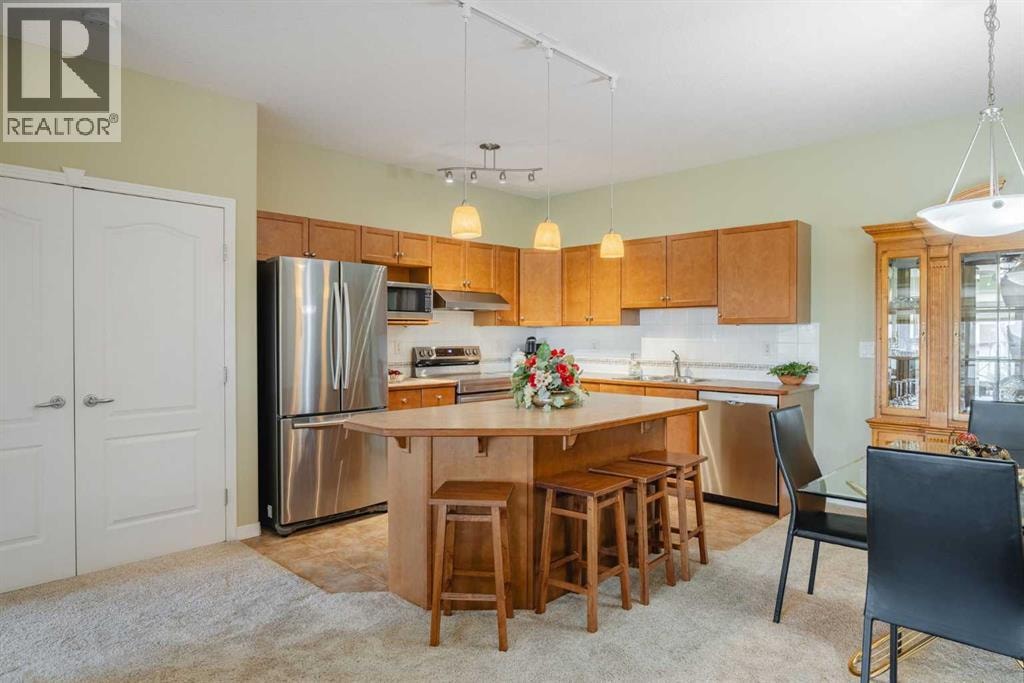 2309, 303 Arbour Crest Drive NW — photo 3