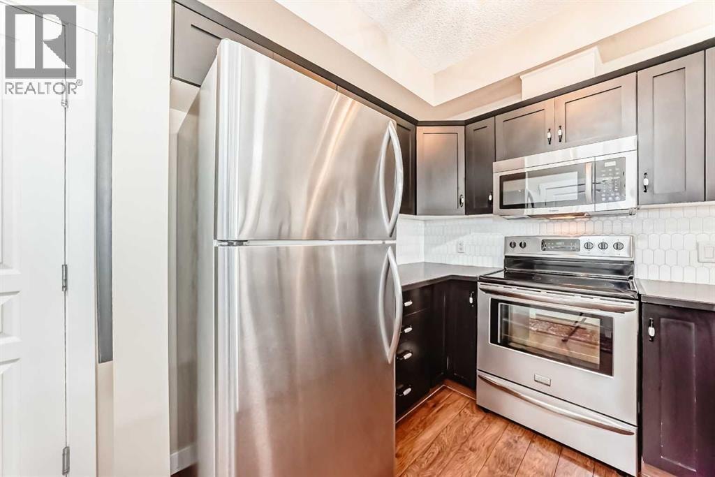 2105, 211 Aspen Stone Boulevard SW — photo 14