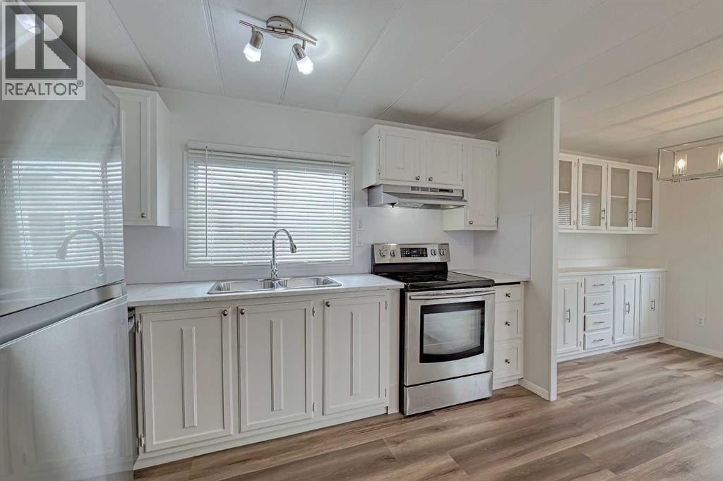 303, 99 Arbour Lake Road NW