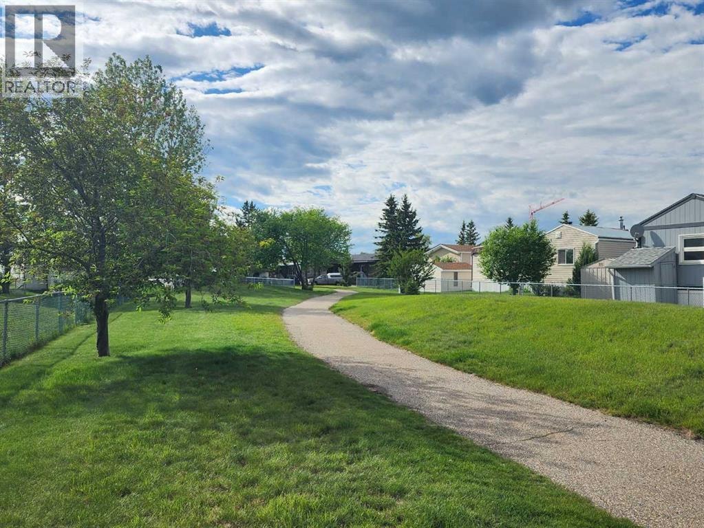 303, 99 Arbour Lake Road NW — photo 46