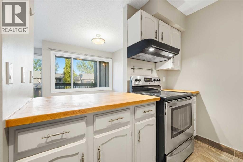 122, 860 Midridge Drive SE — photo 10