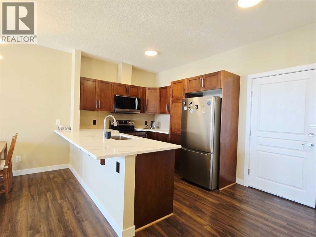 301, 76 Panatella Road NW — photo 1