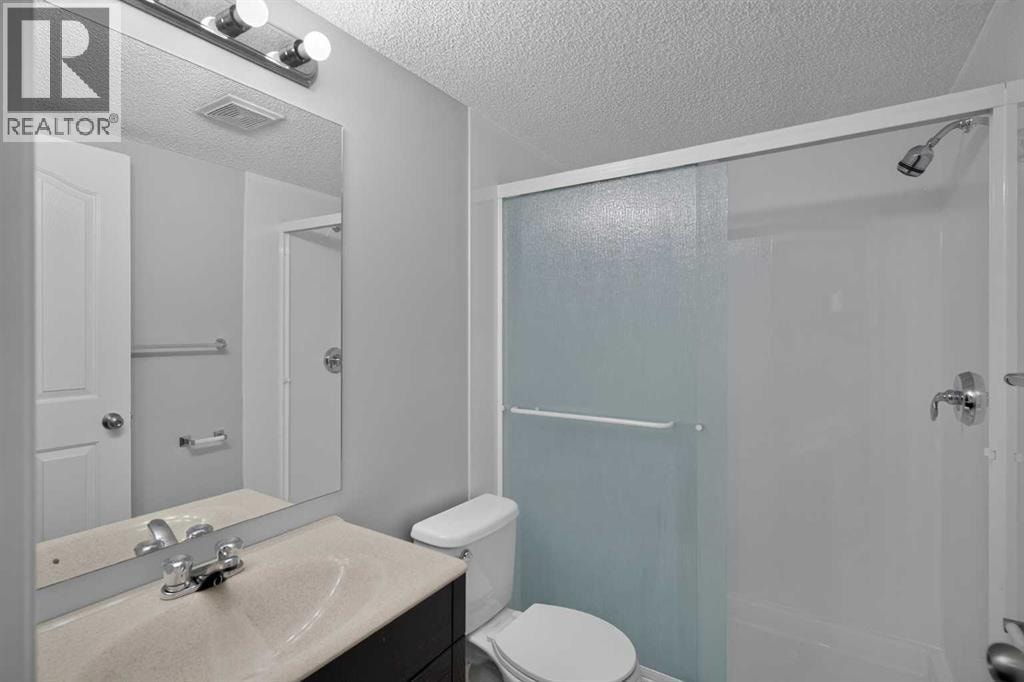 8223, 304 Mackenzie Way SW — photo 18