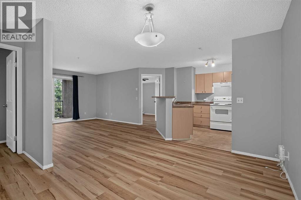 8223, 304 Mackenzie Way SW — photo 9