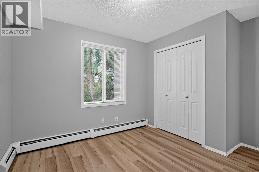 8223, 304 Mackenzie Way SW — photo 20