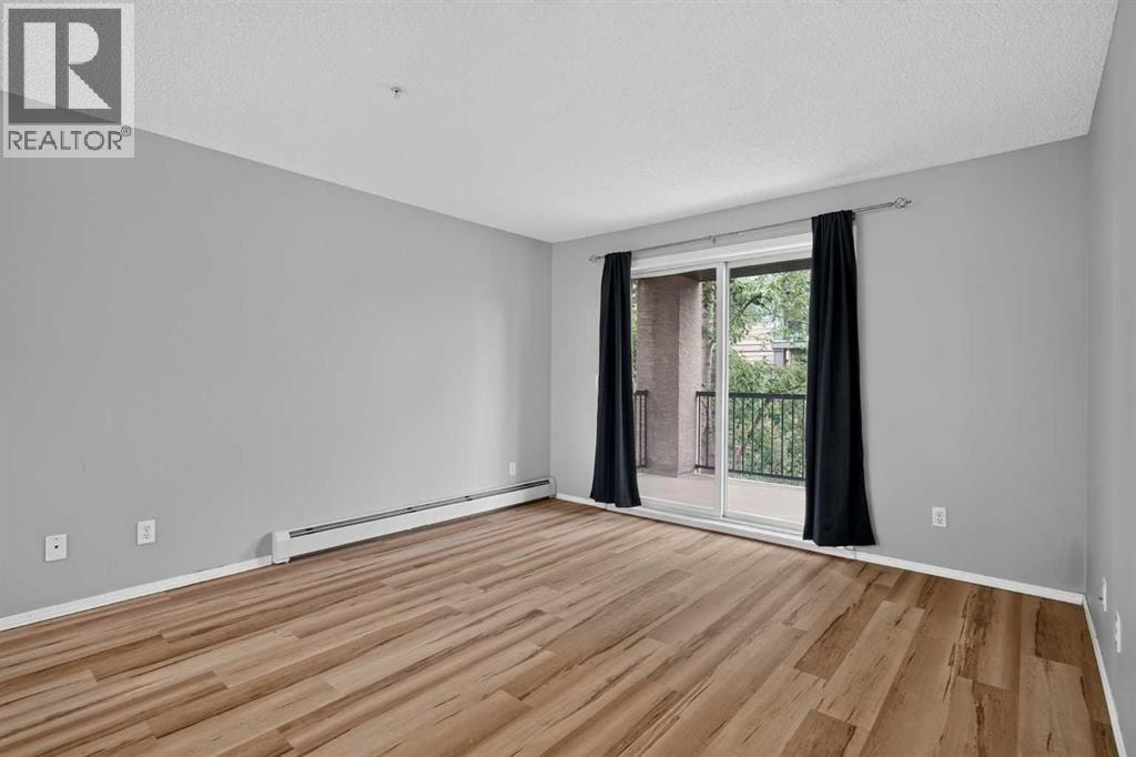 8223, 304 Mackenzie Way SW — photo 10