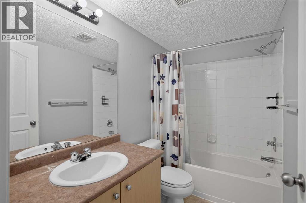 8223, 304 Mackenzie Way SW — photo 21