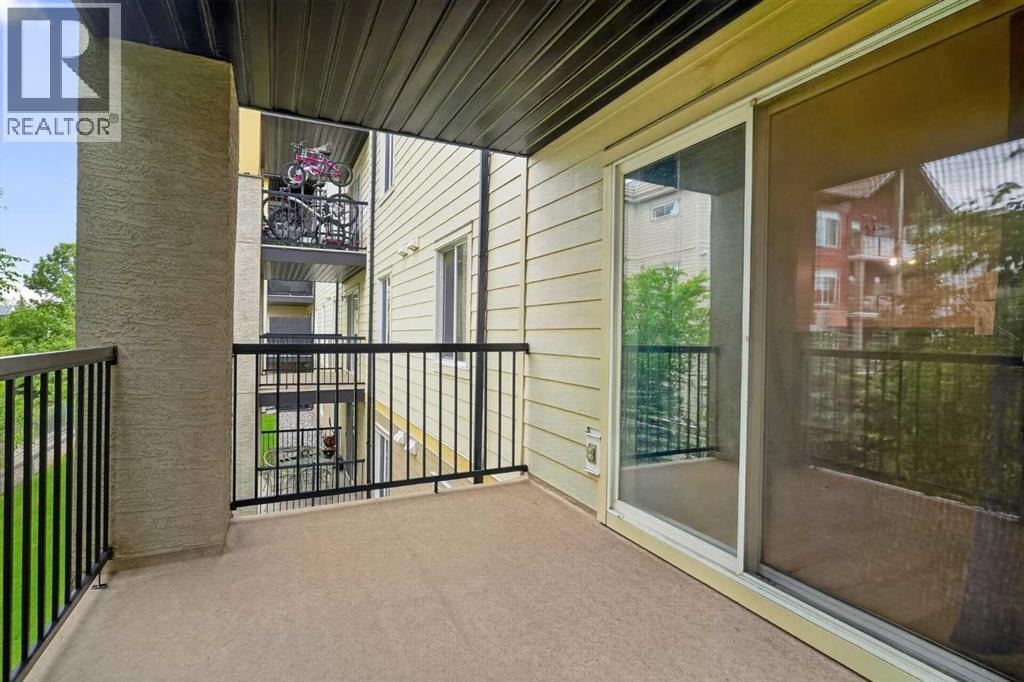 8223, 304 Mackenzie Way SW — photo 15