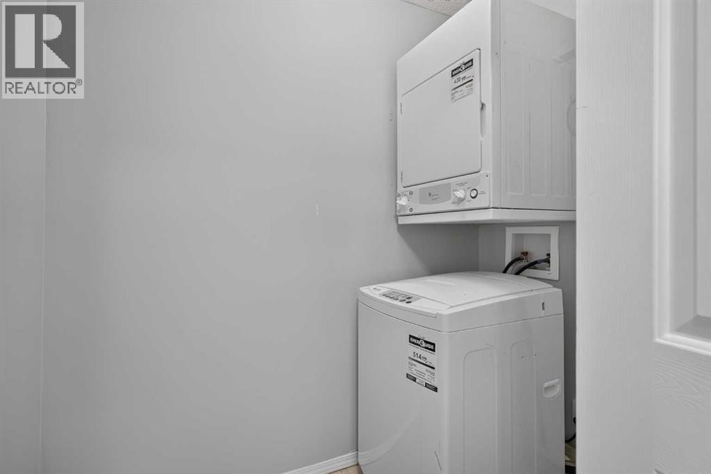 8223, 304 Mackenzie Way SW — photo 22