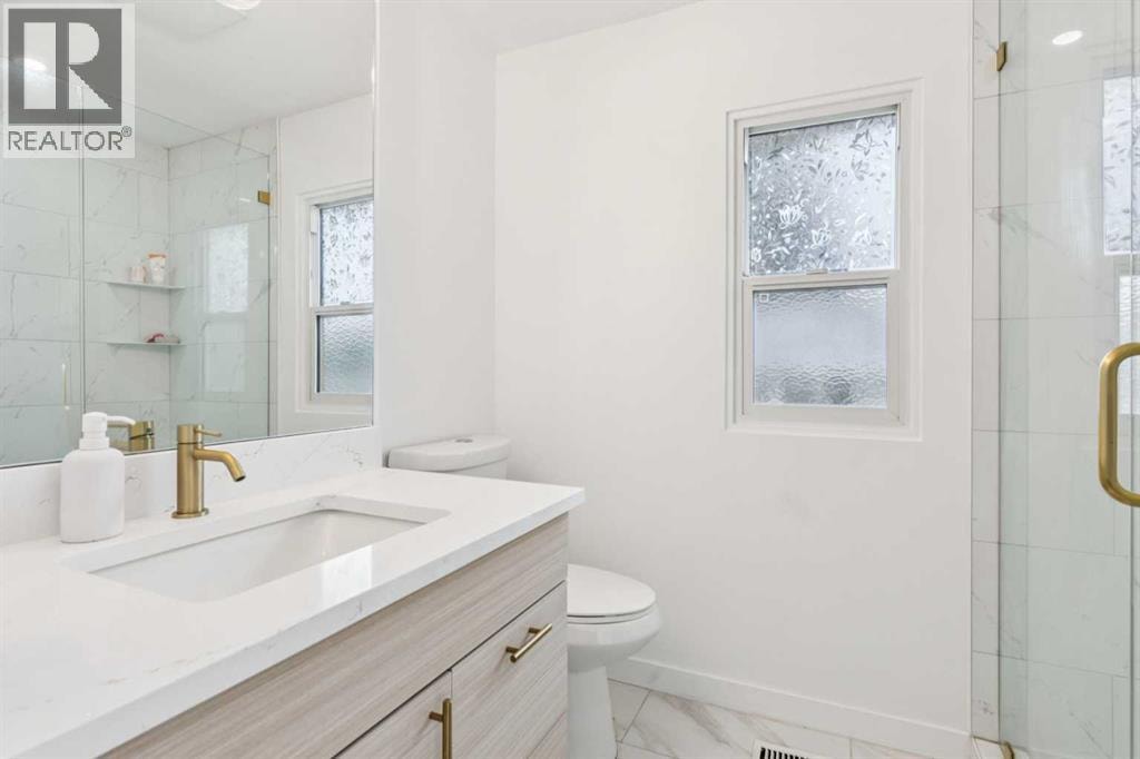 10719 Mapleglen Crescent SE — photo 27